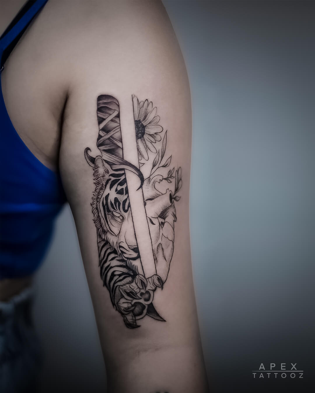 Tiger With Sword Tattoo on body placement by Apex Tattooz