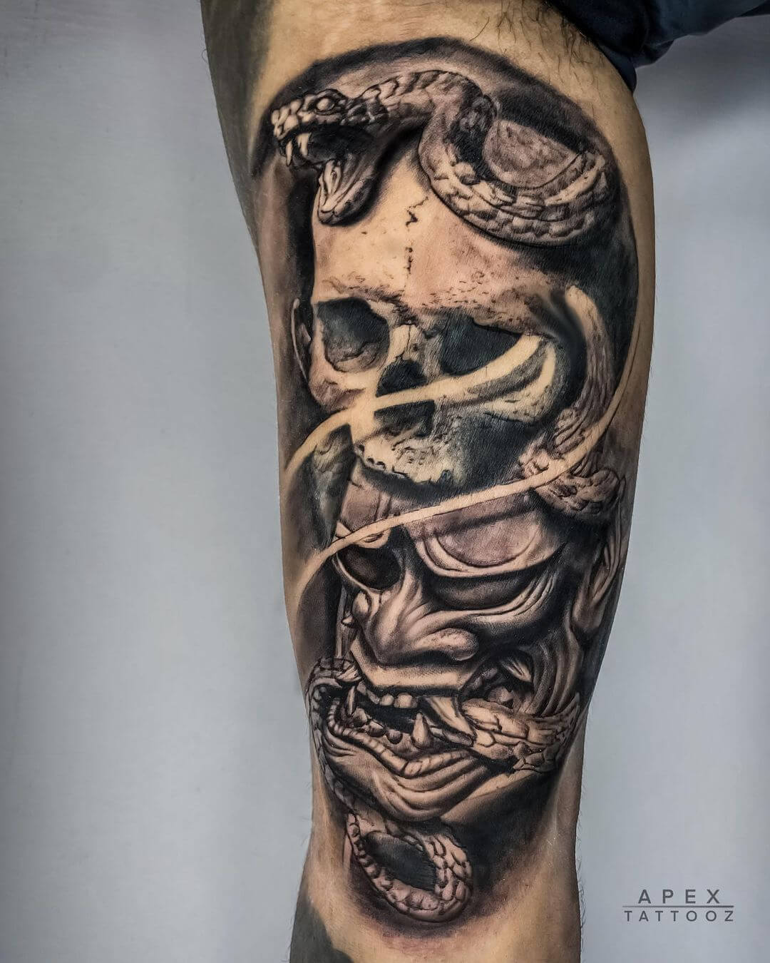 Hannya Mask With Skull and Snake Tattoo on body placement by Apex Tattooz