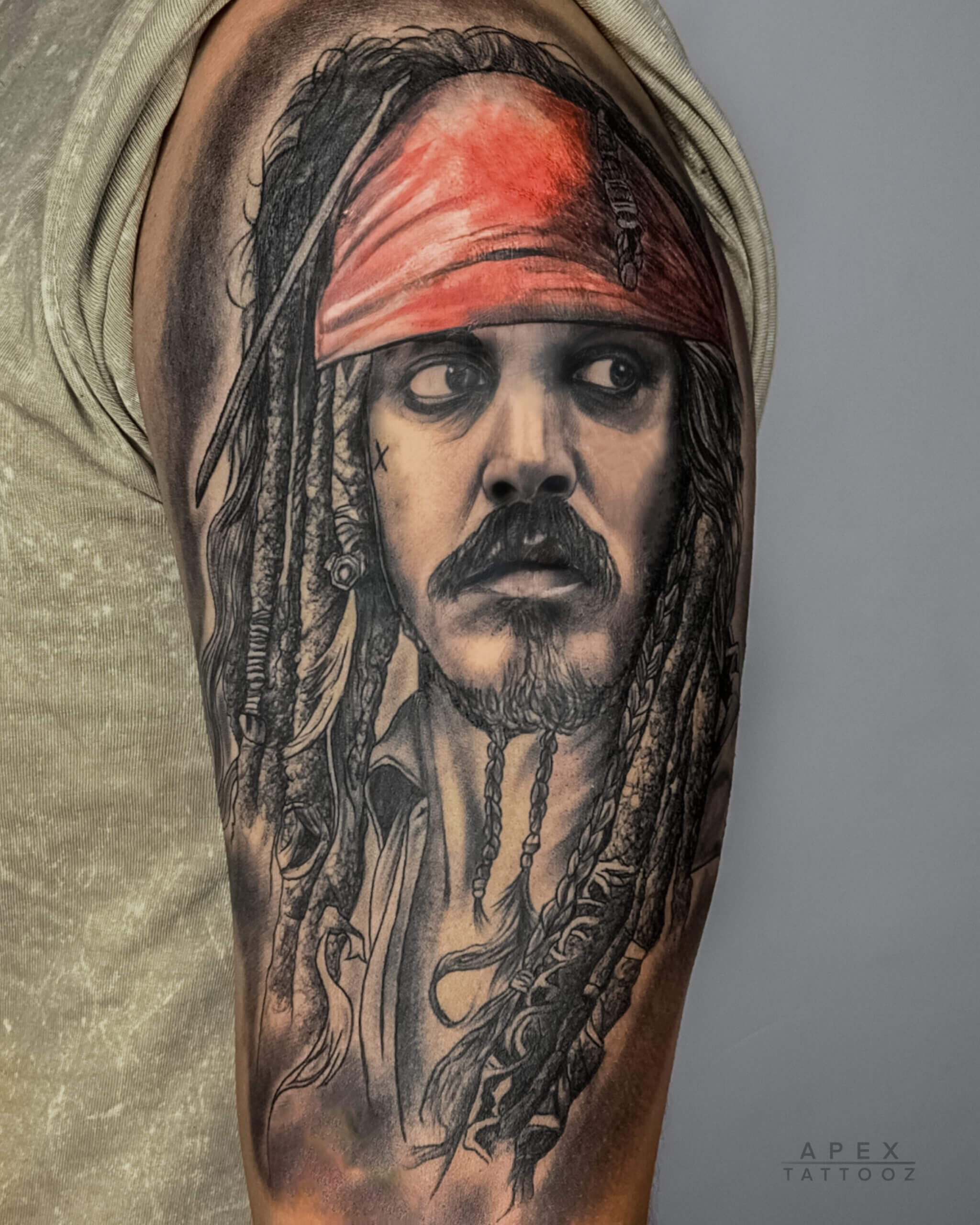 Detailed Jack Sparrow character portrait tattoo by Apex Tattooz