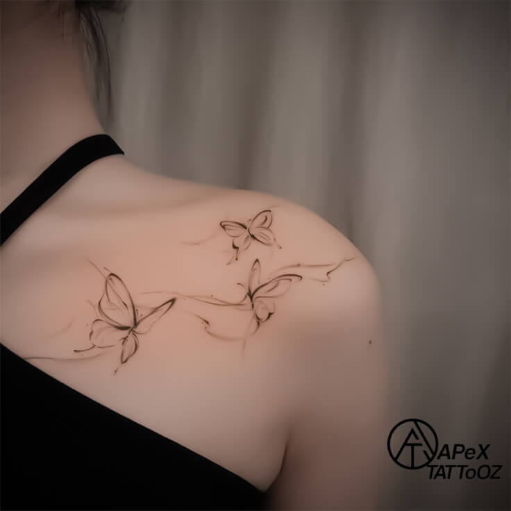 Flowing Butterfly Upper-Back Tattoo on back by Apex Tattooz