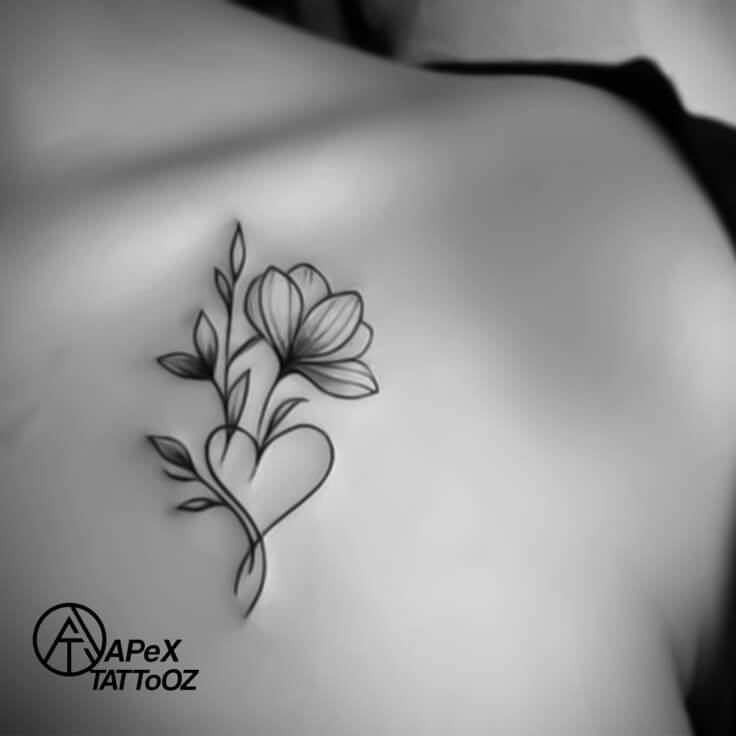 Minimalistic heart and lily tattoo