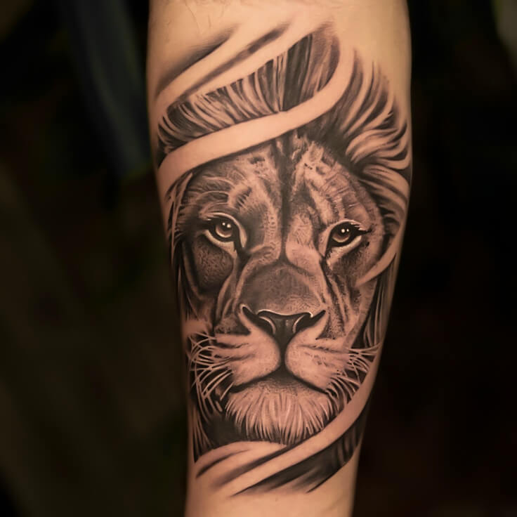 Lion black and grey realism forearm tattoo by Ram Kesarwani