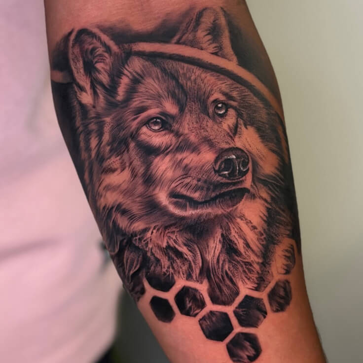 Wolf tattoo with geometric elements by Sharan