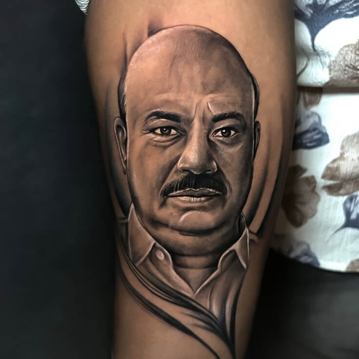 Black and grey portrait realism tattoo by Ram Kesarwani