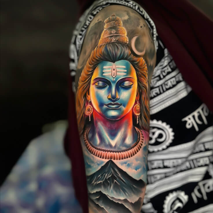 Shiva tattoo by Guru Pujar in vibrant color realism