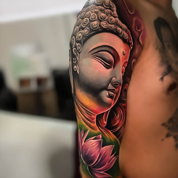 Buddha tattoo by Guru Pujar with vibrant color realism