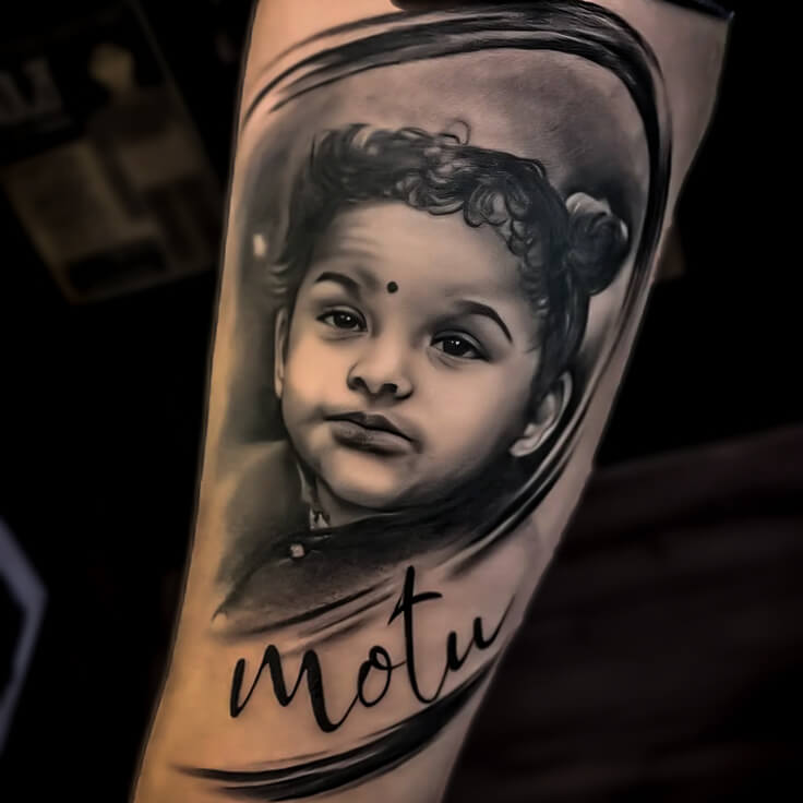 Child portrait realism tattoo by Sohil Khan