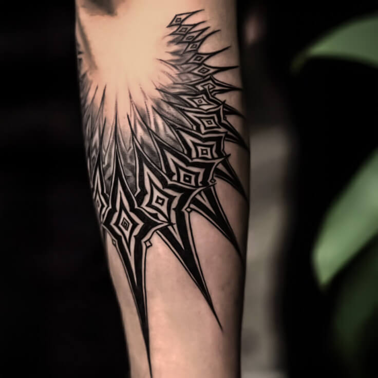 Geometric mandala forearm tattoo by Gautam Birla