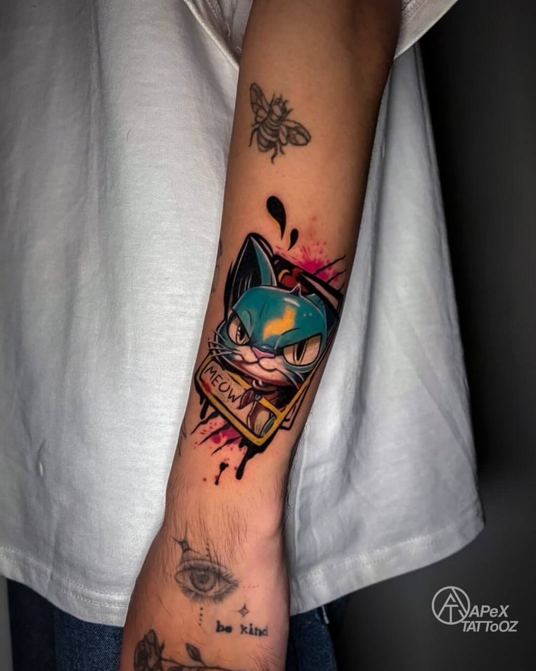 Colour cat character forearm portrait tattoo by Apex Tattooz