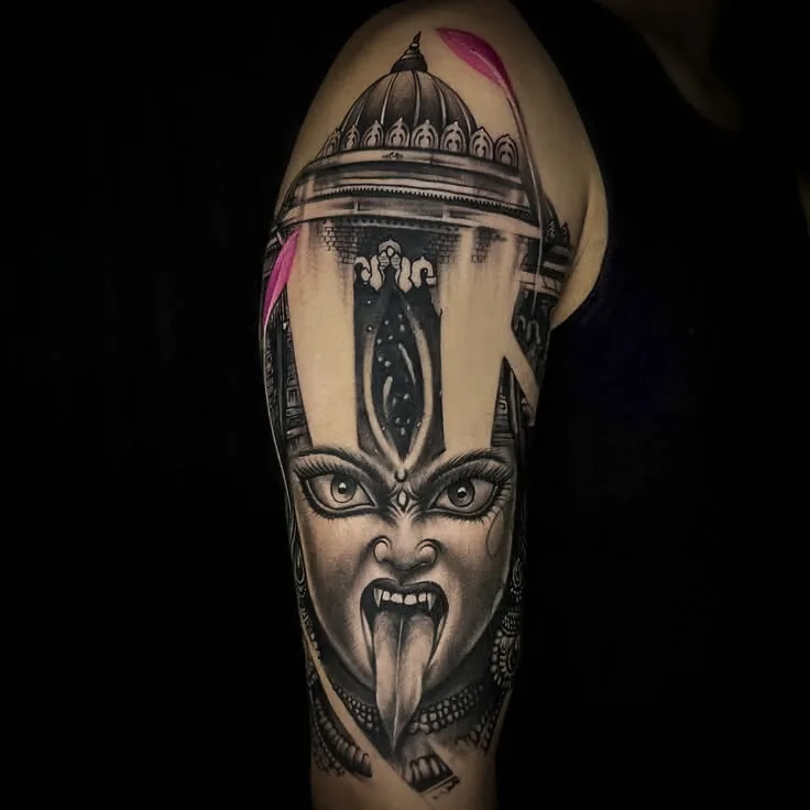 Kali Maa realism tattoo with temple-dome framing and pink accents by Apex Tattooz