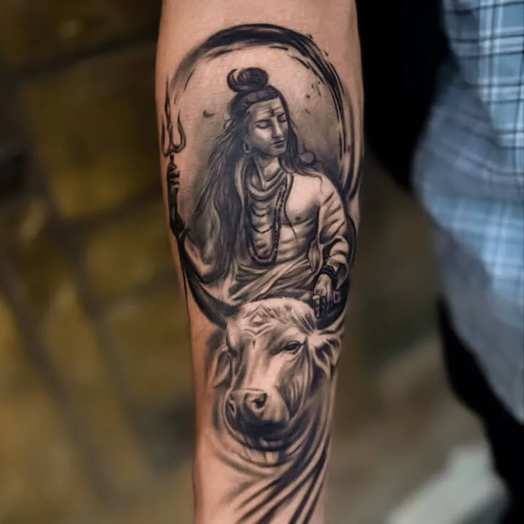 Shiva and Nandi black-and-grey realism forearm tattoo by Apex Tattooz