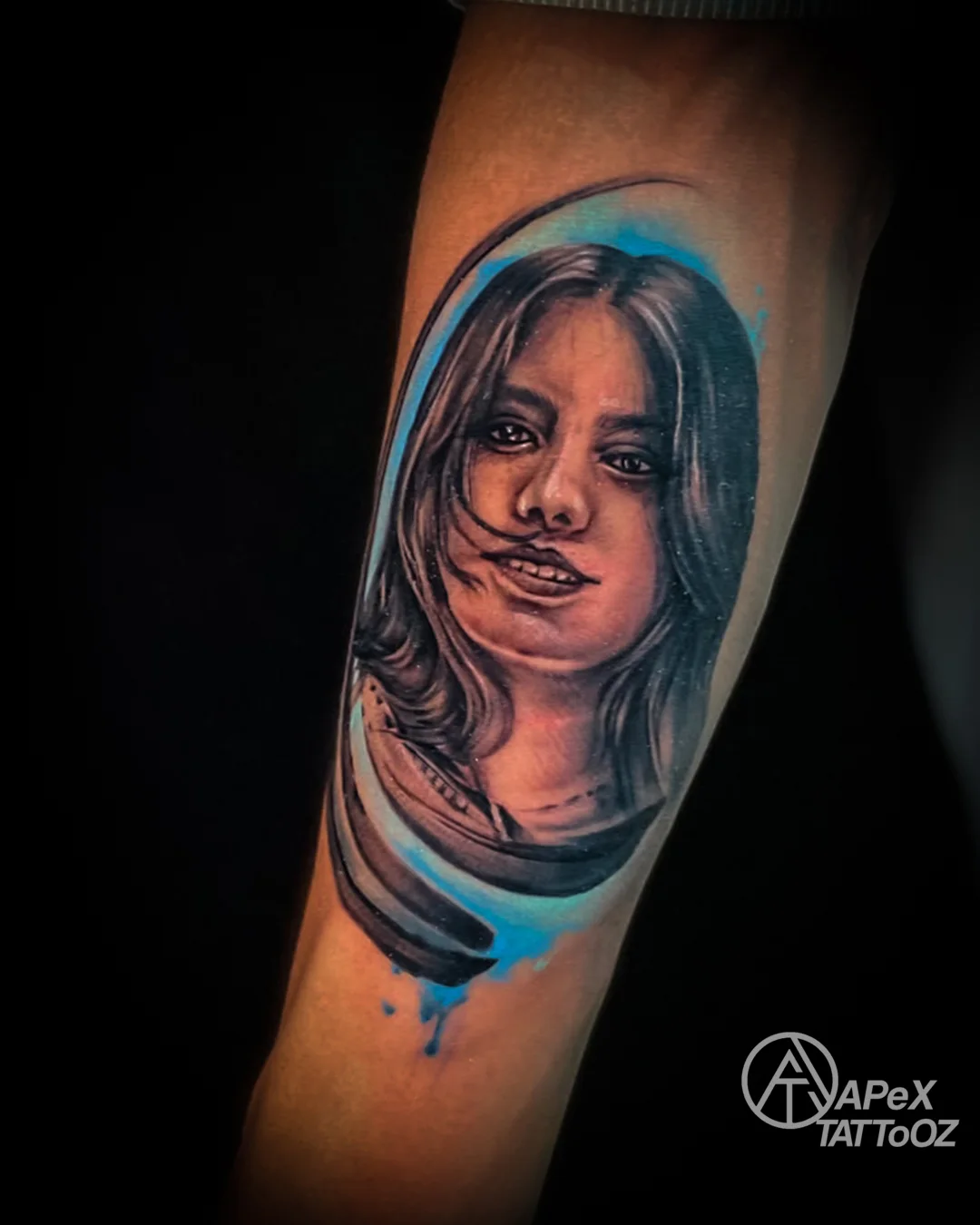 Female portrait realism tattoo with blue accents by Tanmay in Delhi