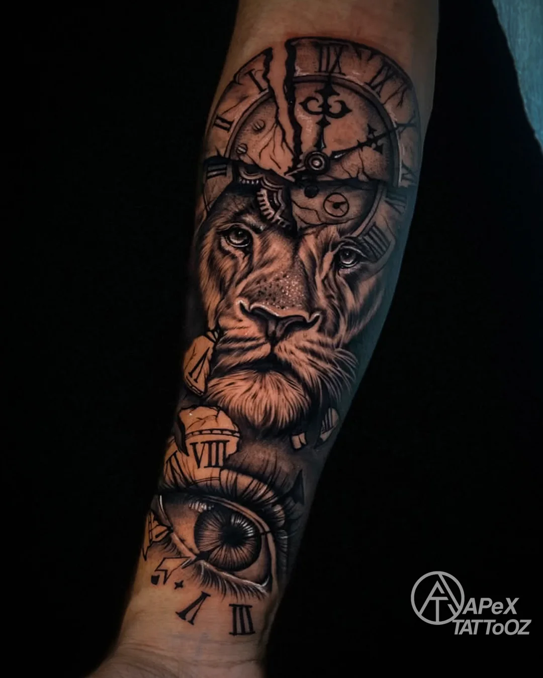 Lion clock and eye realism forearm tattoo by Tanmay in Delhi