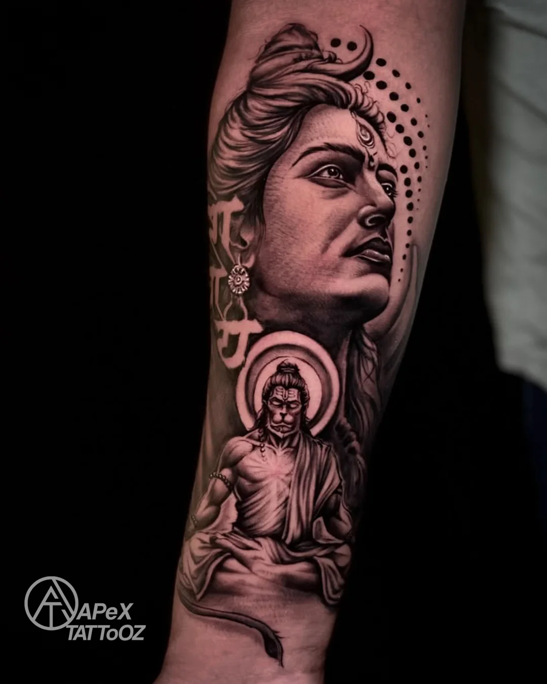 Shiva portrait and Hanuman black and grey forearm tattoo by Tanmay