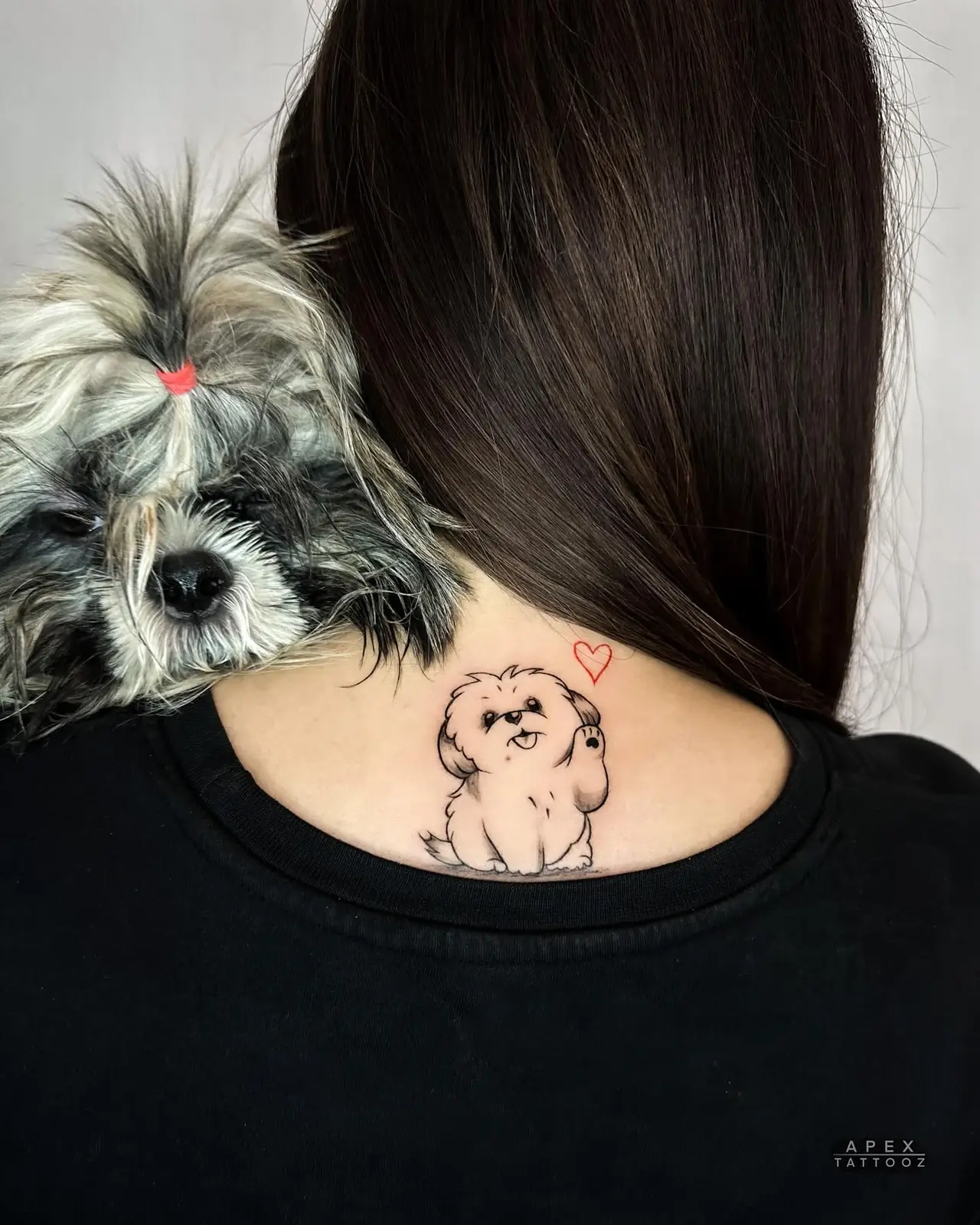 A small dog portrait with a heart at the nape of the neck.