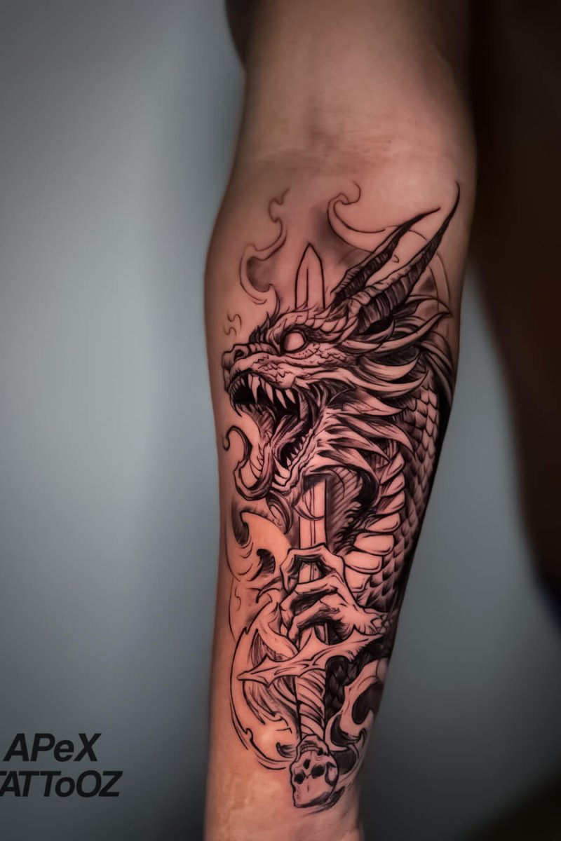 Dragon forearm tattoo design by Apex Tattooz Delhi NCR